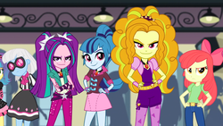 Size: 1366x768 | Tagged: safe, screencap, adagio dazzle, apple bloom, aria blaze, photo finish, sonata dusk, equestria girls, g4, my little pony equestria girls: rainbow rocks, background human, crossed arms, eyebrows, hips, lidded eyes, looking at you, smiling, smirk, the dazzlings