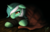 Size: 2000x1278 | Tagged: safe, artist:alyxsp, lyra heartstrings, pony, unicorn, fanfic:background pony, g4, blanket, clothes, crying, fanfic art, female, floor, floppy ears, hoodie, lyre, mare, prone, sad, solo, teary eyes