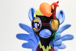 Size: 5184x3456 | Tagged: safe, artist:dustysculptures, rainbow dash, g4, close-up, clothes, costume, craft, goggles, irl, photo, sculpture, shadowbolt dash, shadowbolts costume, sitting, solo