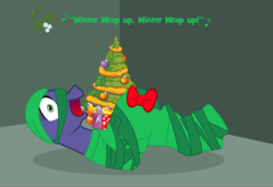 Size: 640x438 | Tagged: safe, mane-iac, earth pony, pony, g4, power ponies (episode), bondage, bow, christmas tree, gift wrapped, hair, hair bondage, mistletoe, open mouth, present, singing, tied up, tree