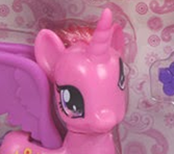 Size: 500x443 | Tagged: safe, princess cadance, g4, bootleg, close-up, derp, female, irl, lovely horse, photo, rainbow power-ified, toy