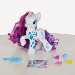 Size: 960x960 | Tagged: safe, rarity, pony, unicorn, g4, cutie mark, electronic toy, female, glamour, irl, mare, photo, solo, toy