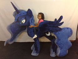 Size: 1024x768 | Tagged: safe, artist:karasunezumi, princess luna, alicorn, human, pony, g4, child, female, humans riding ponies, irl, irl human, life size, mare, mega luna, photo, plushie, riding, target demographic