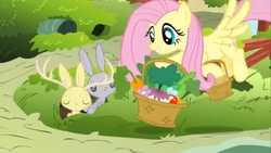 Size: 1366x768 | Tagged: safe, screencap, fluttershy, jackalope, pegasus, pony, rabbit, filli vanilli, g4, animal, basket, feeding, female, food, mare, vegetables, working