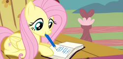 Size: 1365x661 | Tagged: safe, screencap, fluttershy, filli vanilli, g4, book, female, mouth hold, pencil, solo