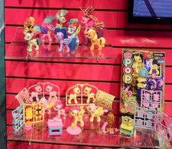 Size: 500x434 | Tagged: safe, applejack, fluttershy, pinkie pie, princess cadance, princess luna, twilight sparkle, zecora, alicorn, pony, zebra, g4, official, female, irl, mare, my little pony pop!, photo, sprue pony, toy, toy fair 2014, twilight sparkle (alicorn)