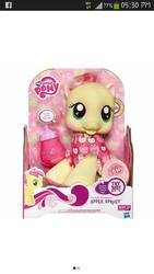 Size: 540x960 | Tagged: safe, apple sprout, pony, g4, official, baby, baby pony, blushing, filly, foal, heart, heart eyes, newborn, onesie, so soft, toy, wingding eyes