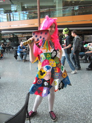 Size: 3000x4000 | Tagged: artist needed, safe, pinkie pie, human, g4, convention, cosplay, irl, irl human, photo, pinkamena diane pie, solo, weapon, youmacon, youmacon 2013