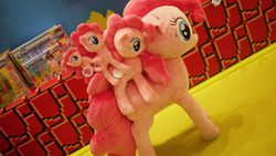 Size: 2000x1124 | Tagged: safe, pinkie pie, earth pony, pony, g4, chemistry, female, galileo chemistry starter set, irl, item shop, mare, multeity, my little pony logo, nici, photo, plushie, ponies riding ponies, ponies riding ponies riding ponies, recursion, riding, self riding, set, too much pink energy is dangerous