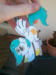 Size: 720x960 | Tagged: safe, artist:partypievt, oc, oc only, oc:chroma feather, pegasus, pony, amputee, hand, hanging, paper child, paper pony, papercraft, photo, prosthetic limb, solo, traditional art