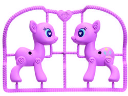 Size: 320x240 | Tagged: safe, pinkie pie, g4, female, heart, heart eyes, irl, my little pony pop!, photo, sprue pony, toy, wingding eyes