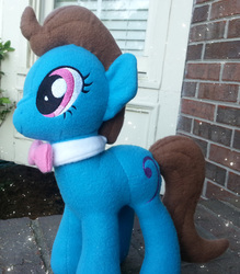 Size: 2112x2408 | Tagged: safe, artist:mintystitch, beauty brass, earth pony, pony, g4, bowtie, irl, outdoors, photo, plushie, side view, solo