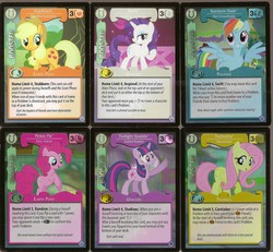 Size: 1024x947 | Tagged: safe, enterplay, applejack, fluttershy, pinkie pie, rainbow dash, rarity, twilight sparkle, earth pony, pegasus, pony, unicorn, g4, my little pony collectible card game, premiere, card game, ccg, female, folded wings, horn, mane six, mare, merchandise, open mouth, open smile, raised hoof, rearing, smiling, spread wings, tail, unicorn twilight, wings