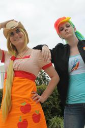 Size: 1366x2048 | Tagged: safe, applejack, rainbow dash, human, g4, cosplay, irl, irl human, photo