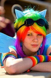 Size: 600x906 | Tagged: safe, artist:meesterfinland, rainbow dash, human, g4, convention, cosplay, crossed arms, goggles, irl, irl human, photo, shutocon, shutocon 2012, solo