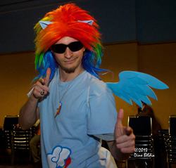 Size: 960x918 | Tagged: artist needed, safe, rainbow dash, human, g4, cosplay, irl, irl human, metrocon, metrocon 2013, photo, rainbro dash, rule 63, solo, sunglasses