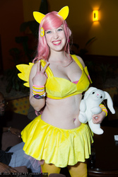 Size: 1365x2048 | Tagged: safe, artist:rae-gunn, fluttershy, human, g4, 2014, animeland wasabi, belly button, belly piercing, bellyring, clothes, convention, cosplay, irl, irl human, midriff, photo, piercing, plushie, skirt, solo