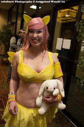 Size: 683x1024 | Tagged: safe, artist:rae-gunn, fluttershy, human, rabbit, g4, animeland wasabi, animeland wasabi 2014, clothes, cosplay, irl, irl human, midriff, photo, plushie, skirt, solo