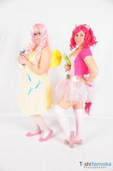 Size: 1275x1920 | Tagged: safe, artist:desertfawn, artist:thewalkingdomi, artist:toshiyamioka, fluttershy, gummy, pinkie pie, human, g4, 2014, clothes, cosplay, dress, glasses, irl, irl human, photo, plushie, skirt, tail, taiyou con, tutu