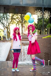 Size: 1378x2048 | Tagged: safe, pinkie pie, human, g4, balloon, clothes, cosplay, irl, irl human, photo, skirt, sneakers, socks, striped socks