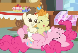 Size: 515x352 | Tagged: safe, screencap, pinkie pie, pound cake, pumpkin cake, baby cakes, g4, baby, baby pony, cake, cake twins, candy, colt, cute, diaper, diapered, diapered colt, diapered filly, diapered foals, eyes closed, female, filly, foal, grin, happy, happy babies, male, on back, open mouth, playing, siblings, sitting, smiling, table, tickling, twins, white diapers