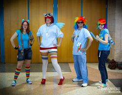 Size: 2048x1594 | Tagged: safe, rainbow dash, human, g4, clothes, cosplay, irl, irl human, photo, rainbow socks, shorts, sneakers, socks, striped socks, suspenders