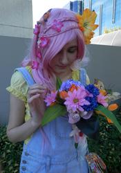 Size: 2994x4288 | Tagged: safe, artist:radsham, fluttershy, human, g4, 2014, cosplay, flower, irl, irl human, overalls, photo, solo, wai-con