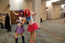 Size: 1280x853 | Tagged: artist needed, safe, artist:foolsteps, pinkie pie, twilight sparkle, human, g4, clothes, convention, cosplay, crossover, gloves, irl, irl human, photo, sailor moon (series), sailor pinkie pie, sailor senshi, sailor twilight