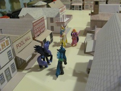 Size: 1095x821 | Tagged: safe, artist:boilerwash1, nightmare moon, princess celestia, queen chrysalis, twilight sparkle, alicorn, pony, g4, blind bag, duel, female, irl, mare, photo, toy, twilight sparkle (alicorn), western