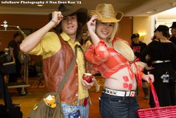 Size: 2048x1365 | Tagged: artist needed, safe, artist:lochlan o'neil, applejack, braeburn, human, g4, 2013, apple, basket, belly button, clothes, convention, cosplay, cowboy hat, front knot midriff, hat, irl, irl human, jeans, midriff, ndk, photo, plushie