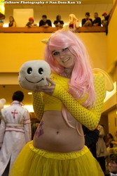 Size: 1365x2048 | Tagged: safe, artist:rae-gunn, fluttershy, human, g4, 2013, belly button, clothes, convention, cosplay, irl, irl human, midriff, ndk, photo, plushie, skirt, solo, tofusnow
