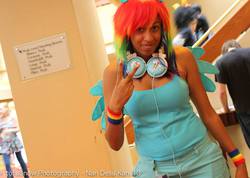 Size: 2048x1456 | Tagged: artist needed, safe, rainbow dash, human, g4, 2013, convention, cosplay, headphones, irl, irl human, ndk, photo, solo, wristband