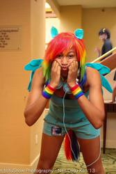 Size: 1365x2048 | Tagged: artist needed, safe, rainbow dash, human, g4, 2013, clothes, convention, cosplay, dashface, headphones, irl, irl human, ndk, photo, shorts, solo, wristband