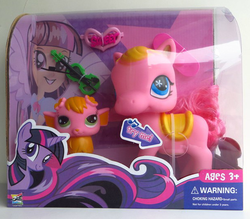 Size: 613x538 | Tagged: safe, twilight sparkle, equestria girls, g4, abomination, bootleg, chinese, female, irl, littlest pet shop, musical instrument, photo, saddle, tat, toy, violin