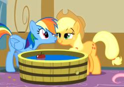 Size: 923x649 | Tagged: safe, screencap, applejack, rainbow dash, earth pony, pegasus, pony, g4, party of one, apple, apple bobbing, female, food, funny face, mare, scrunchy face