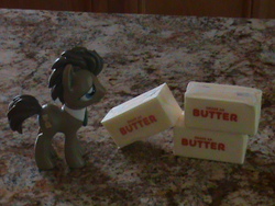 Size: 640x480 | Tagged: safe, doctor whooves, time turner, g4, butter, photo, that pony sure does love butter, vinyl figure