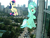 Size: 1280x960 | Tagged: safe, artist:junkiesnewb, artist:somerandomminion, artist:tamalesyatole, bon bon, lyra heartstrings, sweetie drops, earth pony, pony, g4, amused, city, evil smile, giant bon bon (sweetie drops), giant earth pony, giant lyra heartstrings, giant pony, giant unicorn, giantess, highrise ponies, irl, lyra is amused, macro, photo, ponies in real life, sitting, sitting bon bon, traffic, vector