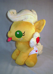 Size: 710x1000 | Tagged: safe, artist:sugarstitch, applejack, earth pony, pony, g4, baby, baby pony, babyjack, foal, irl, photo, plushie, sitting, solo, tongue out, younger
