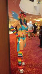 Size: 1082x1920 | Tagged: safe, artist:salaciouseos, rainbow dash, human, g4, arm warmers, armpits, artifact, belly button, belt, bikini, clothes, cosplay, cutie mark, dragon con, goggles, high heels, irl, irl human, leg warmers, photo, rainbow socks, sexy, socks, striped socks, suspenders, swimsuit