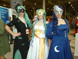 Size: 4608x3456 | Tagged: safe, artist:eframtrabbit, masquerade, princess celestia, princess luna, queen chrysalis, human, g4, 2012, clothes, convention, cosplay, dress, female, irl, irl human, mask, masquerade mask, new york comic con, photo, trio, trio female