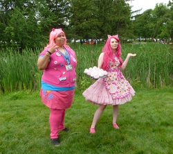 Size: 3456x3068 | Tagged: safe, artist:eframtrabbit, pinkie pie, human, g4, animenext, apron, clothes, convention, cosplay, cupcake, day, food, high res, irl, irl human, photo