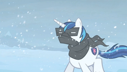 Size: 1365x768 | Tagged: safe, screencap, shining armor, g4, the crystal empire, clothes, male, scarf, snow, snow goggles, snowfall, solo