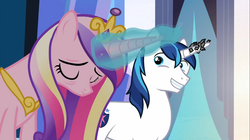 Size: 1365x767 | Tagged: safe, screencap, princess cadance, shining armor, pony, unicorn, g4, the crystal empire, duo, female, glowing horn, horn, horn crystals, magic, magic aura, magic suppression, male, mare, stallion, tired