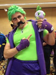Size: 600x800 | Tagged: safe, artist:jamesalpha, spike, human, g4, babscon, babscon 2014, convention, cosplay, hand wraps, irl, irl human, moustache, necklace, photo, plushie, spike plushie