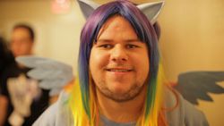 Size: 876x493 | Tagged: safe, rainbow dash, human, g4, brony, cosplay, documentary, duckery in the comments, fox news, irl, irl human, photo, thousand yard stare