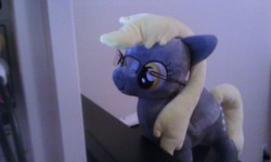 Size: 1280x768 | Tagged: safe, artist:onlyfactory, derpy hooves, pegasus, pony, g4, bootleg, female, glasses, irl, mare, plushie, solo