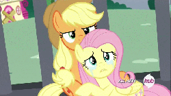 Size: 700x393 | Tagged: safe, screencap, applejack, fluttershy, earth pony, pegasus, pony, g4, twilight's kingdom, angry, animated, applejack is not amused, applejack's hat, betrayed, cage, comforting, cowboy hat, crying, duo, female, floppy ears, folded wings, glare, heartbreak, hub logo, hug, looking at someone, mare, ponytail, poor fluttershy, sad, sitting, stetson, unamused