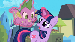 Size: 1365x768 | Tagged: safe, screencap, spike, twilight sparkle, dragon, pony, unicorn, g4, my little pony: friendship is magic, the crystal empire, duo, female, magic, magic aura, male, mare, telekinesis, unicorn twilight