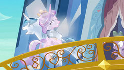 Size: 1365x768 | Tagged: safe, screencap, princess cadance, shining armor, g4, the crystal empire, crystallized, female, glomp, hug, husband and wife, male