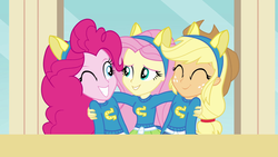 Size: 1280x720 | Tagged: safe, screencap, applejack, fluttershy, pinkie pie, equestria girls, g4, my little pony equestria girls, applejack's hat, cowboy hat, female, hat, helping twilight win the crown, hug